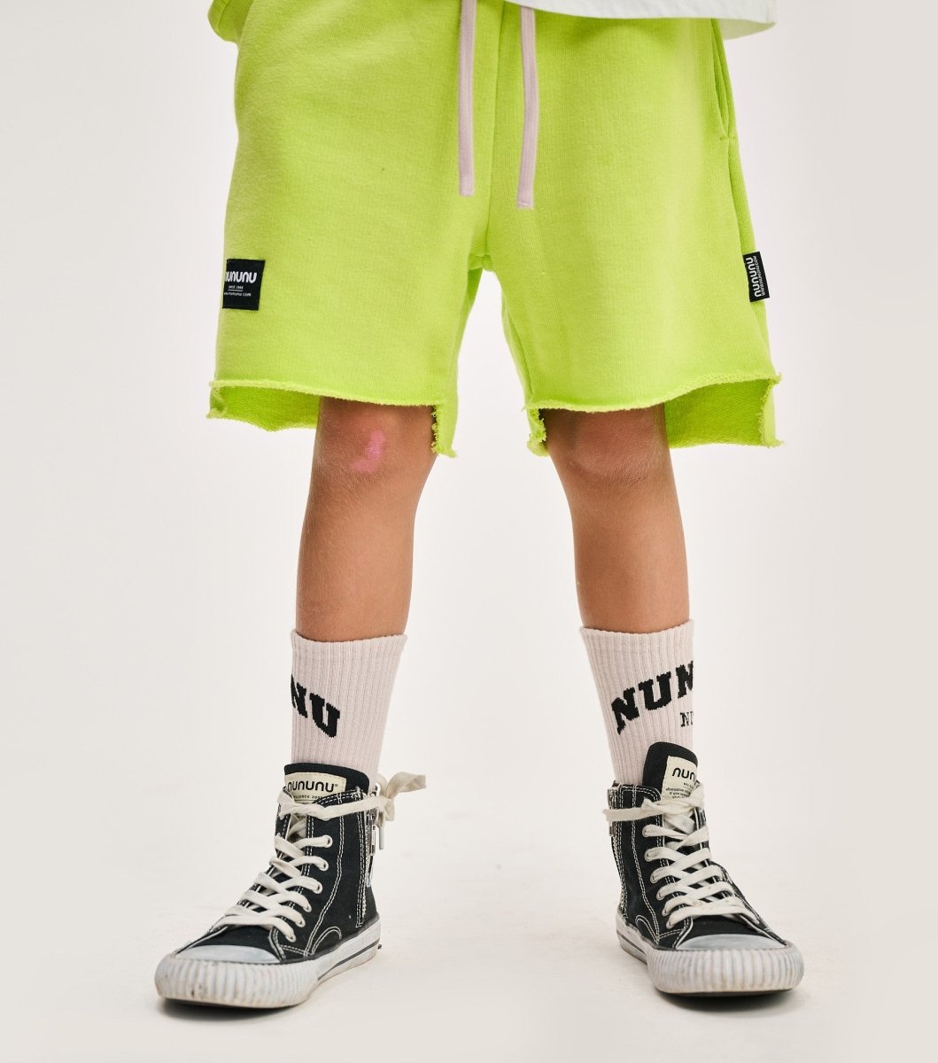 HOT LIME UNBALANCED SHORTS - SHORTS