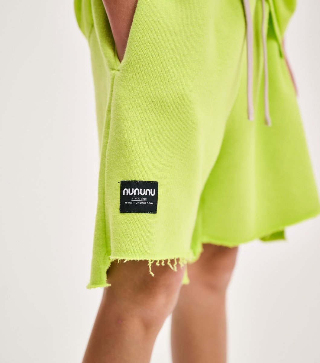 HOT LIME UNBALANCED SHORTS - SHORTS