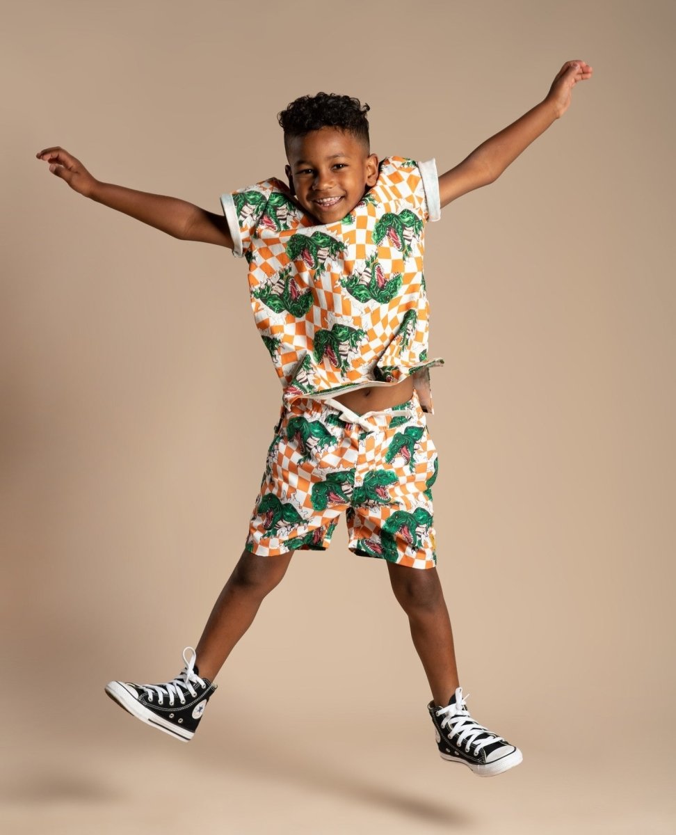 CHECKERED DINO SWIM TRUNKS - SWIM TRUNKS