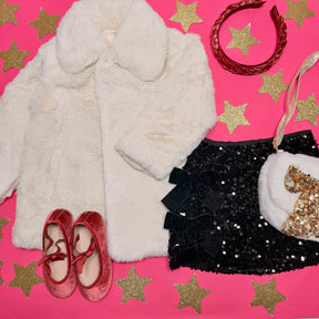 SEQUIN BOW SKORT