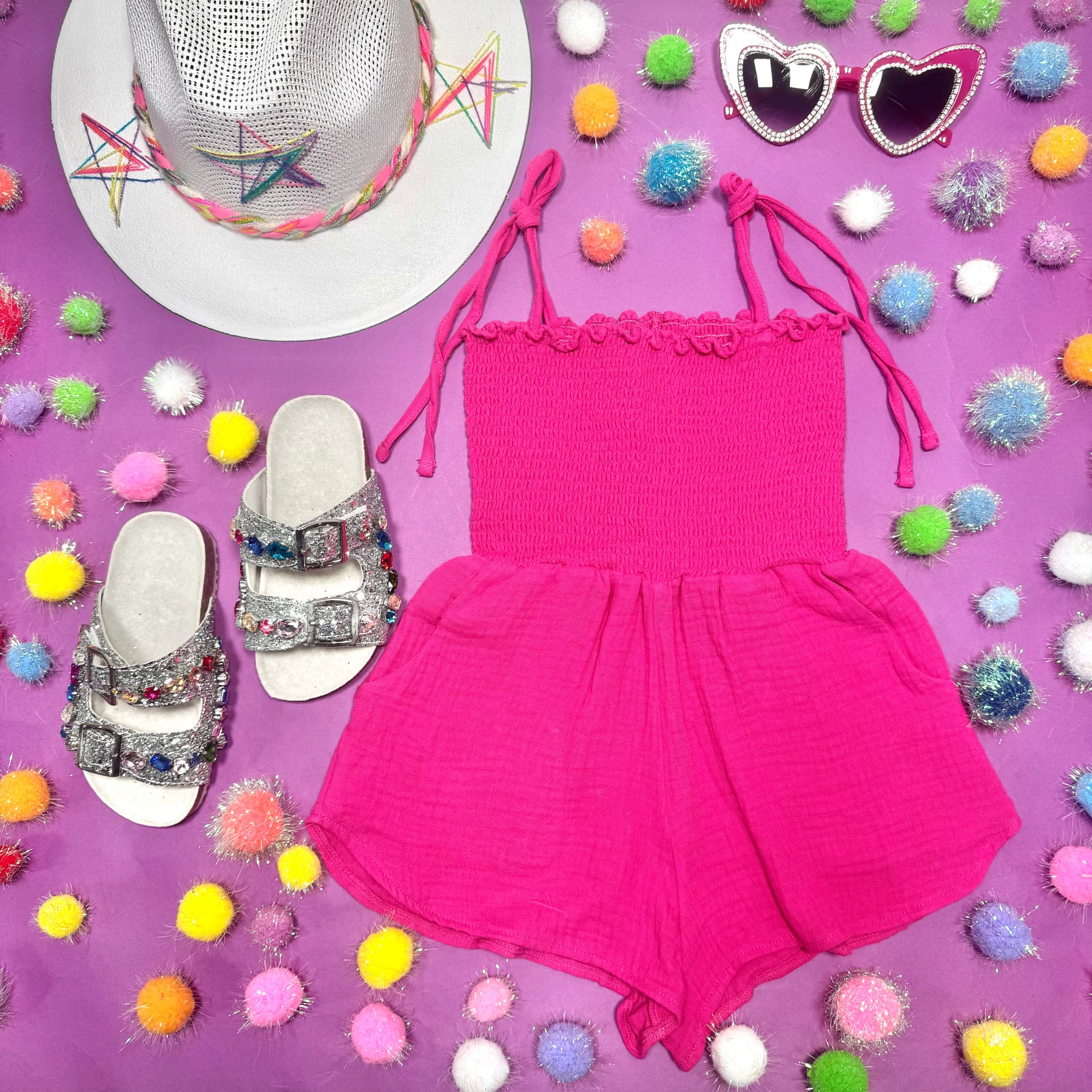 PINK PASSION IRIS T0REY SMOCKED ROMPER
